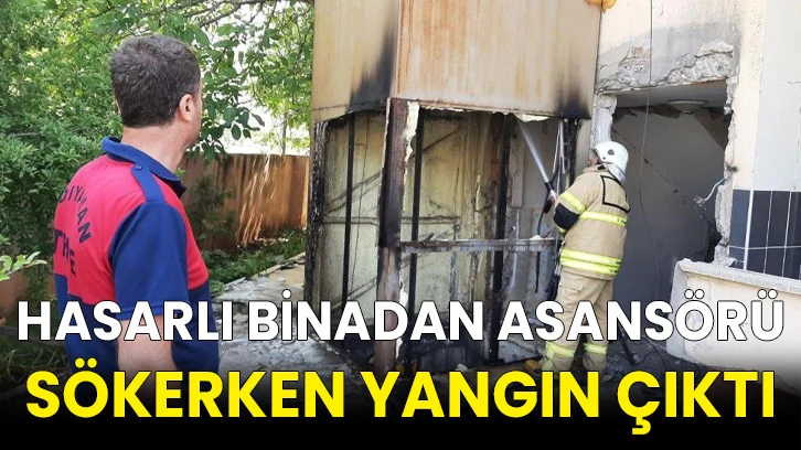Hasarlı binadan asansörü sökerken yangın çıktı