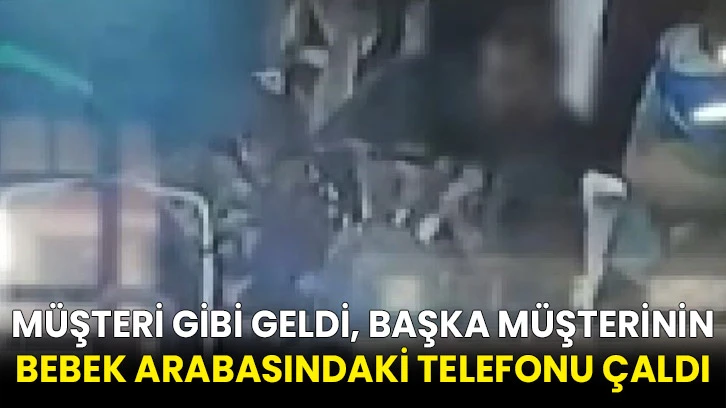 Müşteri gibi geldi, başka müşterinin bebek arabasındaki telefonu çaldı