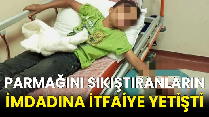 Parmağını sıkıştıranların imdadına itfaiye yetişti