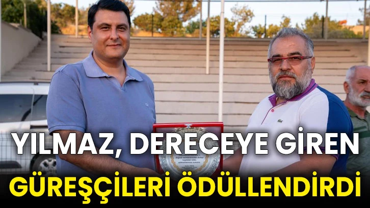 Yılmaz, dereceye giren güreşçileri ödüllendirdi