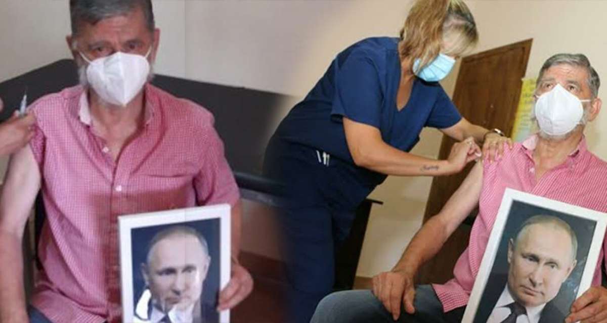 Arjantin'de Roque Perez Belediye Başkanı, elinde Putin portresiyle aşı oldu
