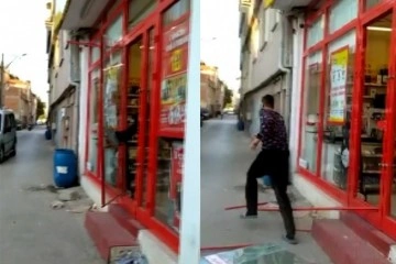 Bursa'da markete kilitlenen hırsız camı kırarak böyle kaçtı