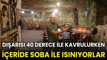 Dışarısı 40 derece ile kavrulurken içeride soba ile ısınıyorlar