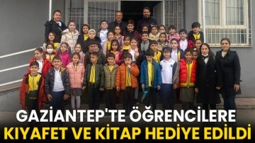 Gaziantep'te &ouml;ğrencilere kıyafet ve kitap hediye edildi