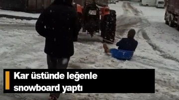 Kar üstünde leğenle snowboard yaptı