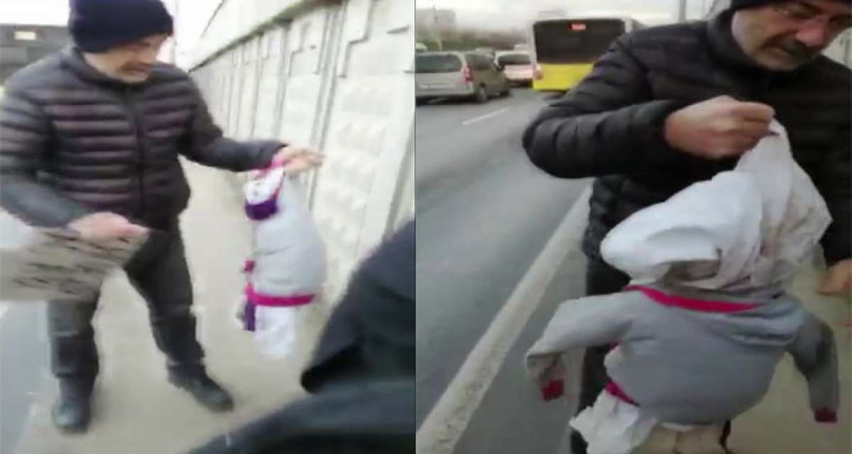 'Kardeşler aç abi' pankartıyla dilenen kadının kucağından bez bebek çıktı