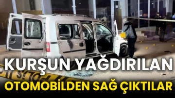 Kurşun yağdırılan otomobilden sağ çıktılar