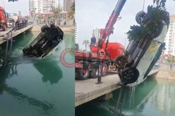 Otomobil sulama kanalına d&uuml;şt&uuml;, s&uuml;r&uuml;c&uuml; 20 metre s&uuml;r&uuml;klendikten sonra kurtuldu