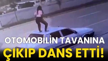  Otomobilin tavanına çıkıp dans etti!