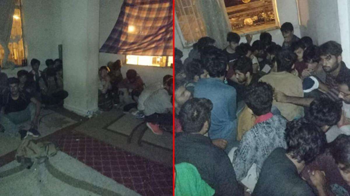Van'da iki apartmana baskın! Balık istifi odaya sıkışan 115 Afgan uyruklu göçmen yakalandı